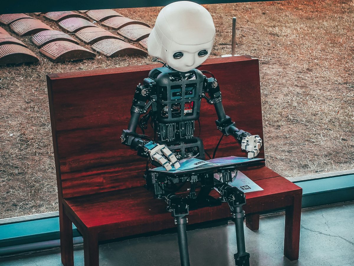 AI robot writing content on a bench