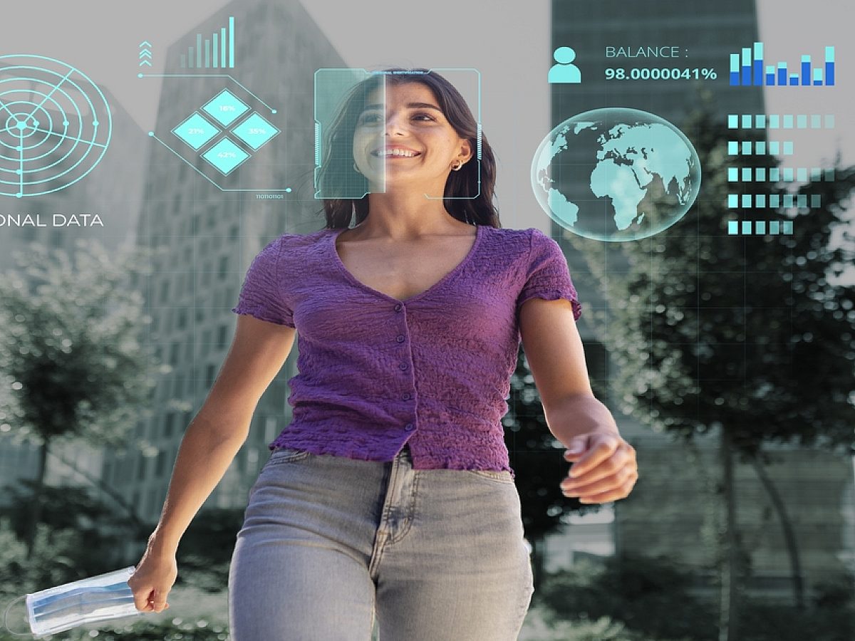 A laptop screen displaying multilingual auto-captions on a video call, symbolising accessibility for deaf and hard-of-hearing viewers.