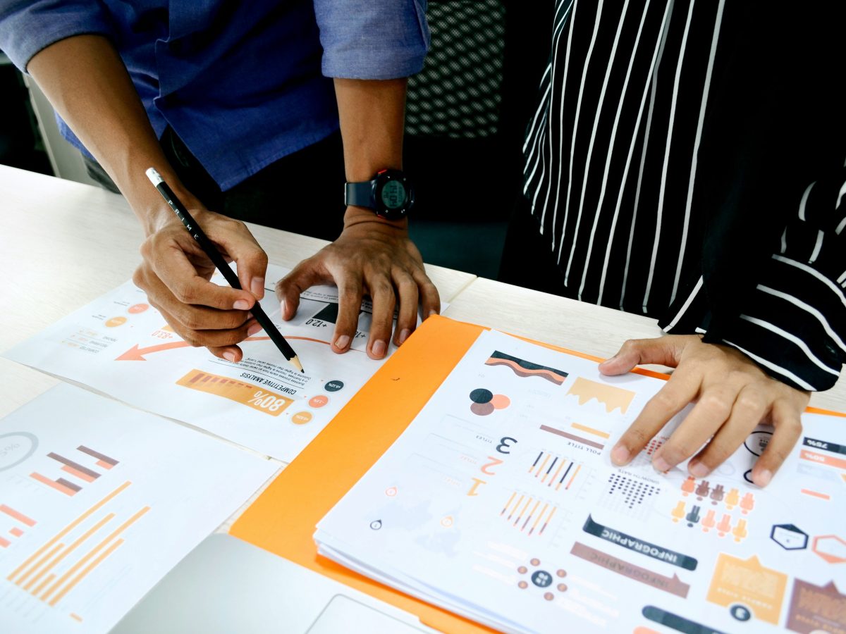 person analyzing data on a desk