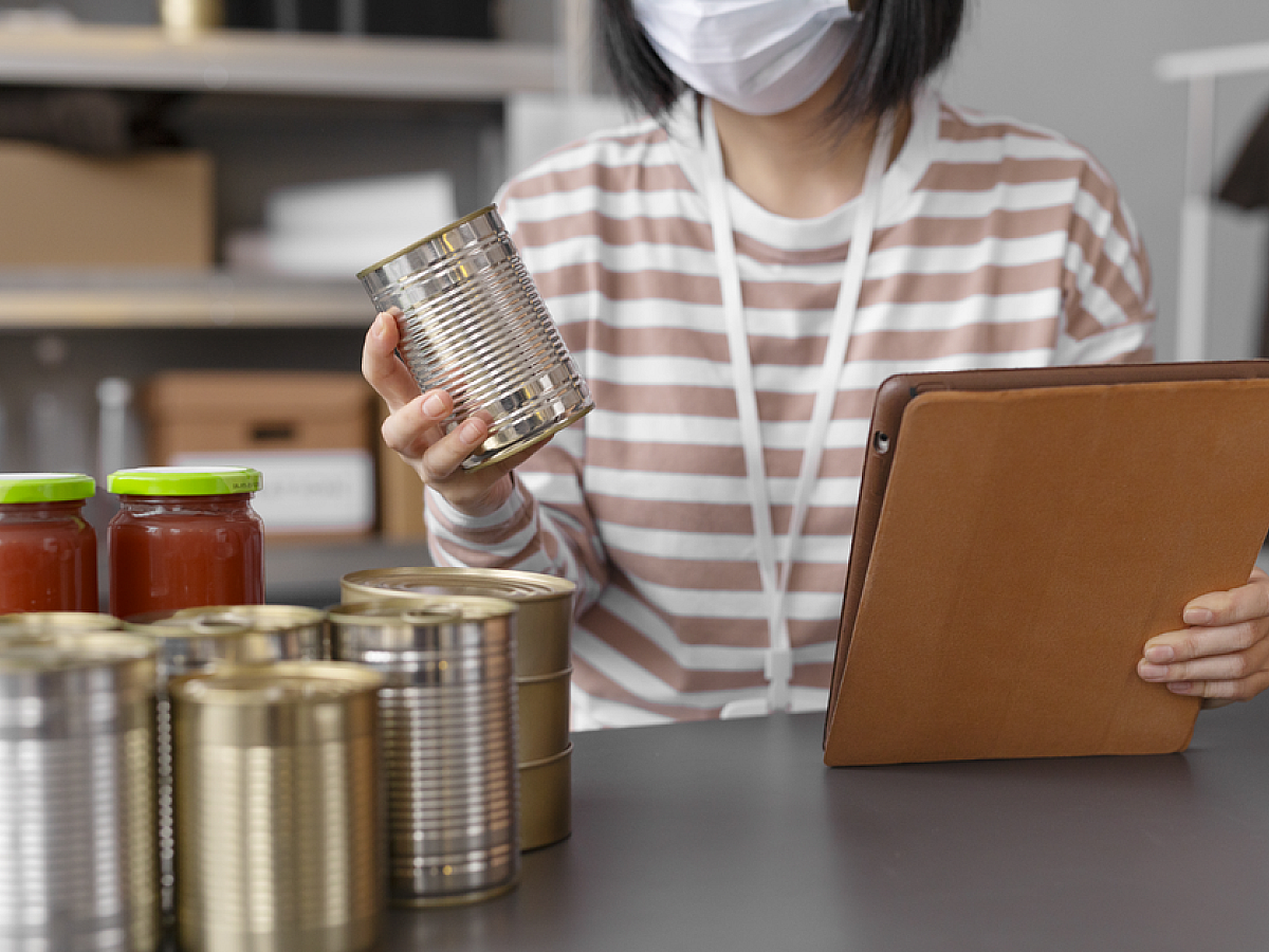 A professional linguist reviewing medical packaging and clinical trial documents to ensure accurate life sciences translation